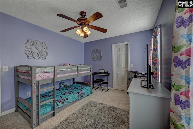 27 Lacebark Ln, Elgin, SC 29045 - carpeted bedroom featuring a ceiling fan and a textured ceiling