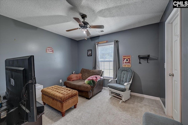 27 Lacebark Ln, Elgin, SC 29045 - living area featuring ceiling fan, light colored carpet, and a textured ceiling