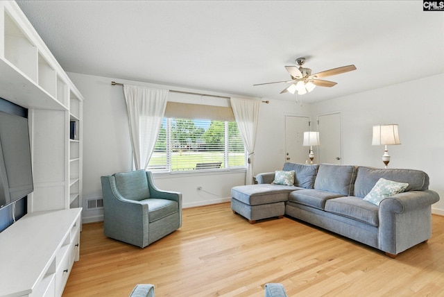 1159 Starview Dr, West Columbia, SC 29172 - living room featuring light wood finished floors and a ceiling fan