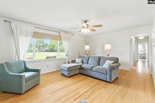 1159 Starview Dr, West Columbia, SC 29172 - living area with light wood-style floors and a ceiling fan