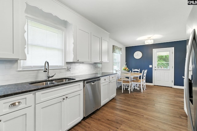 1159 Starview Dr, West Columbia, SC 29172 - kitchen featuring dishwasher, tasteful backsplash, and white cabinetry
