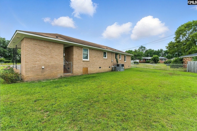 1159 Starview Dr, West Columbia, SC 29172 - rear view of property featuring brick siding and crawl space