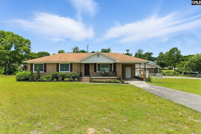 1159 Starview Dr, West Columbia, SC 29172 - ranch-style house with covered porch, driveway, a carport, and brick siding