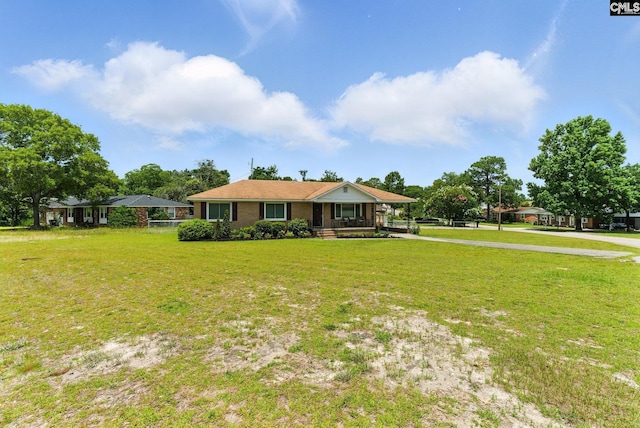1159 Starview Dr, West Columbia, SC 29172 - view of front of property with a front lawn and covered porch