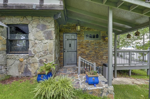 648 E Point Dr, Gilbert, SC 29054 - property entrance featuring stone siding and covered porch