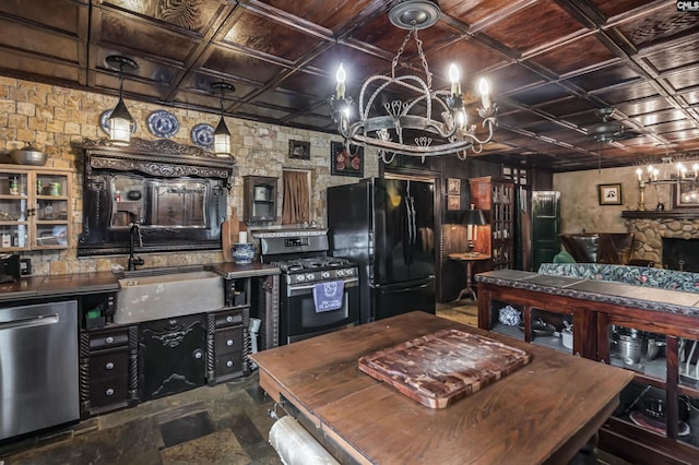 648 E Point Dr, Gilbert, SC 29054 - kitchen with appliances with stainless steel finishes, a chandelier, an ornate ceiling, dark stone finish floors, and butcher block countertops