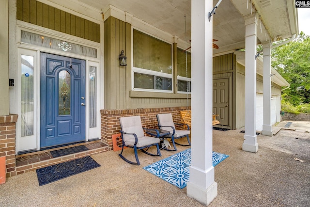 1037 Ridgeview Cir, Elgin, SC 29045 - doorway to property with covered porch and a garage