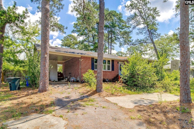 2900 N Beltline Blvd, Columbia, SC 29204 - view of front of property with brick siding, driveway, and an attached carport