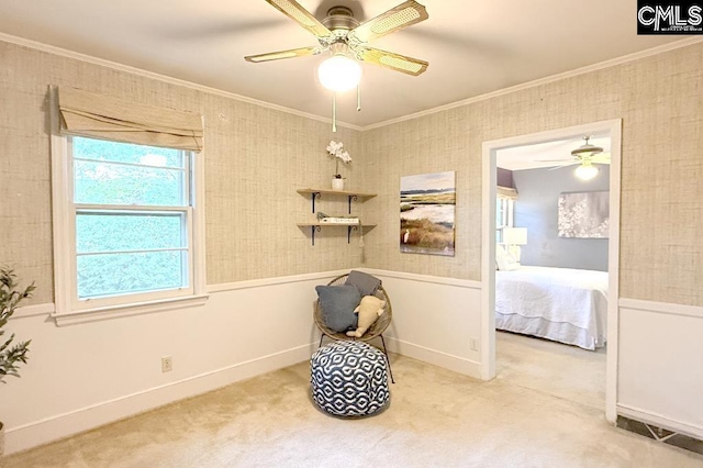 224 17th St, West Columbia, SC 29169 - sitting room featuring ceiling fan, crown molding, carpet flooring, and a wainscoted wall