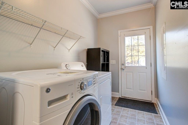 laundry room featuring crown molding, independent washer and dryer, and light tile flooring