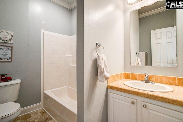 full bathroom with toilet, ornamental molding, shower / washtub combination, tile flooring, and vanity