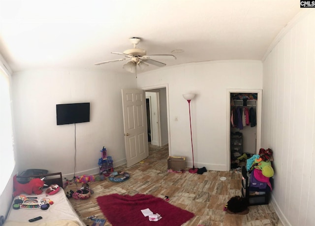 bedroom featuring a closet and ceiling fan