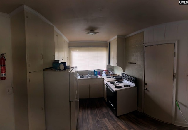 kitchen featuring sink, white appliances, dark wood-type flooring, and white cabinets