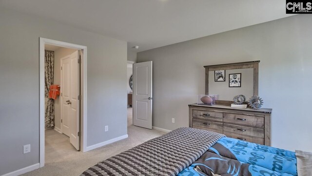 bedroom with light carpet