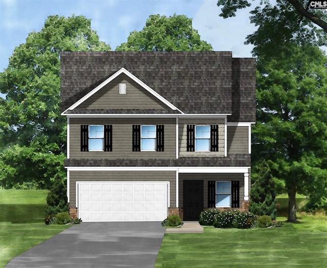 view of front of house featuring a front yard and a garage