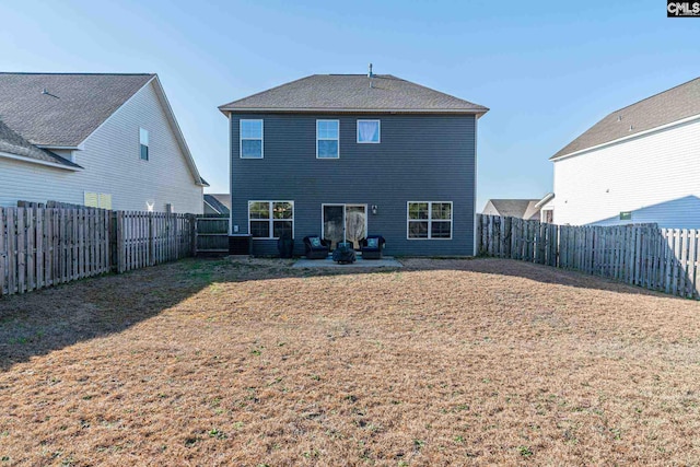 rear view of house with a patio