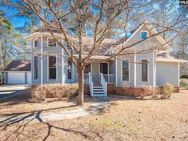 view of front of property featuring a porch and a garage