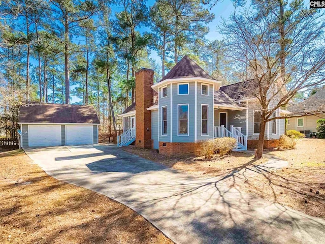 view of front of property featuring a porch and a garage