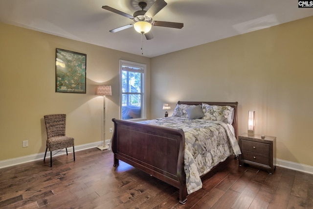 bedroom featuring ceiling fan and dark hardwood / wood-style floors