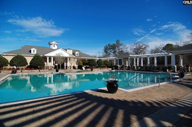 view of pool featuring a patio