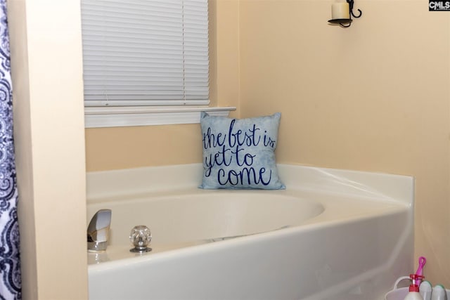 bathroom with a bath to relax in