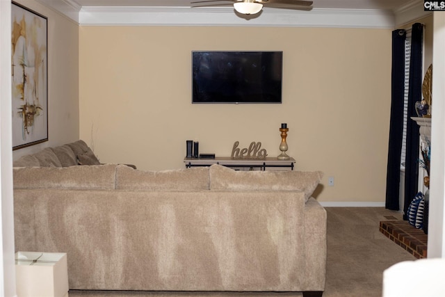 carpeted living room with crown molding and ceiling fan