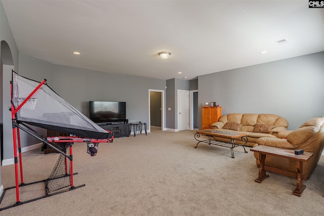 living room featuring light carpet