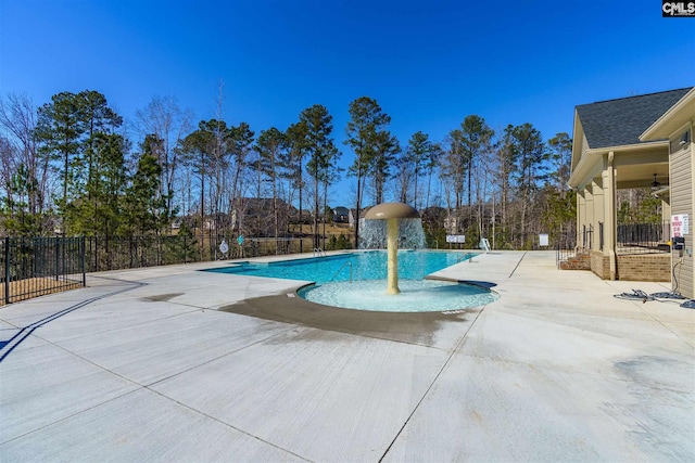 view of swimming pool featuring a patio