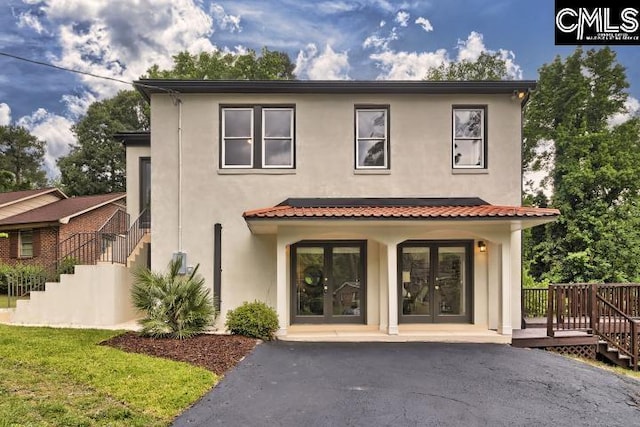 view of front of property featuring a wooden deck