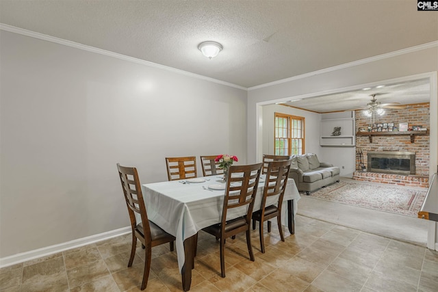 dining space with a textured ceiling, ceiling fan, light tile flooring, and a fireplace