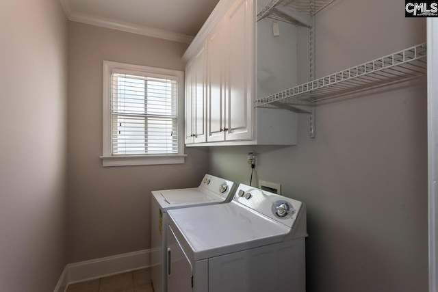 laundry room with cabinets, tile floors, separate washer and dryer, washer hookup, and crown molding