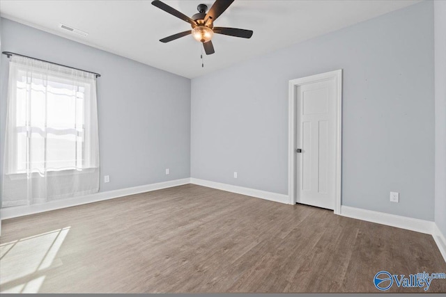 unfurnished room featuring ceiling fan and wood-type flooring