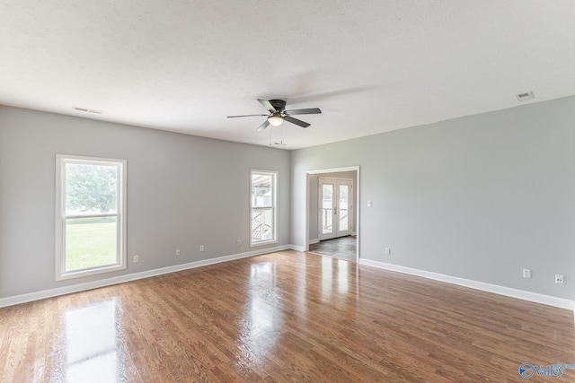 11228 Stewart Rd, Tanner, AL 35671 - spare room with ceiling fan, wood finished floors, and baseboards