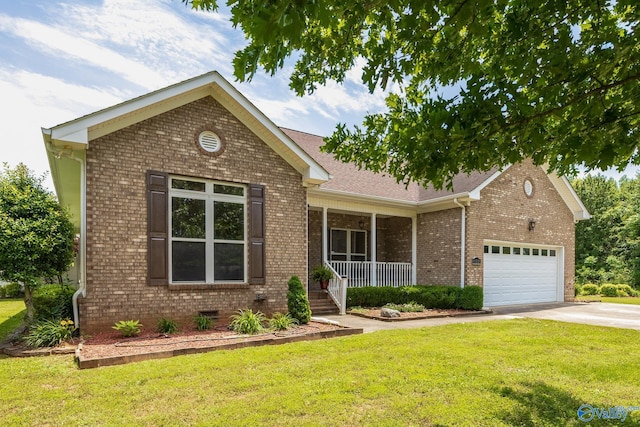 11228 Stewart Rd, Tanner, AL 35671 - view of front of house with brick siding, a garage, driveway, and a front yard