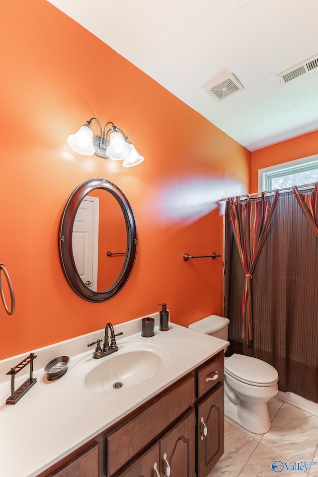 11228 Stewart Rd, Tanner, AL 35671 - bathroom with vanity and toilet