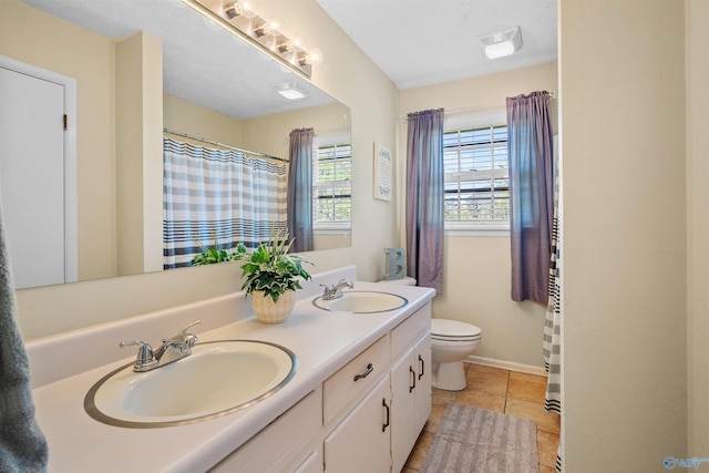 full bath featuring tile patterned flooring, visible vents, a sink, and toilet