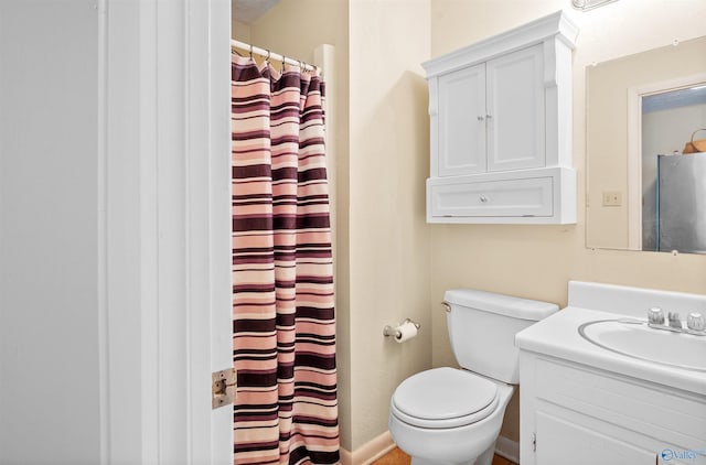 full bath featuring toilet, vanity, and a shower with curtain