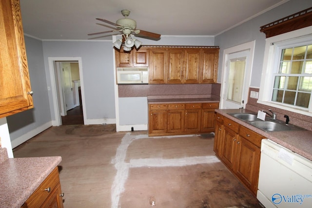 kitchen featuring white appliances, carpet, ornamental molding, sink, and ceiling fan