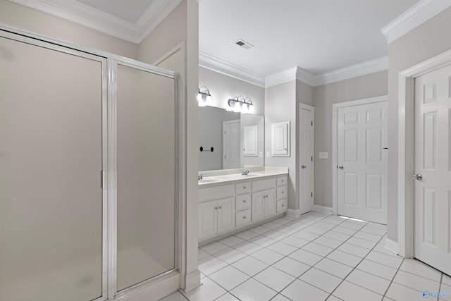 bathroom with ornamental molding, a stall shower, visible vents, and a sink