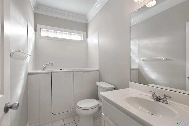 bathroom featuring toilet, ornamental molding, vanity, a bath, and tile patterned floors