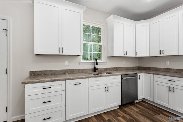 4452 Sibert St S, Gadsden, AL 35903 - kitchen with dishwasher, dark wood finished floors, white cabinets, and dark countertops