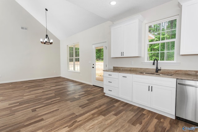 4452 Sibert St S, Gadsden, AL 35903 - kitchen with dishwasher, vaulted ceiling, dark wood-style floors, a chandelier, and white cabinetry