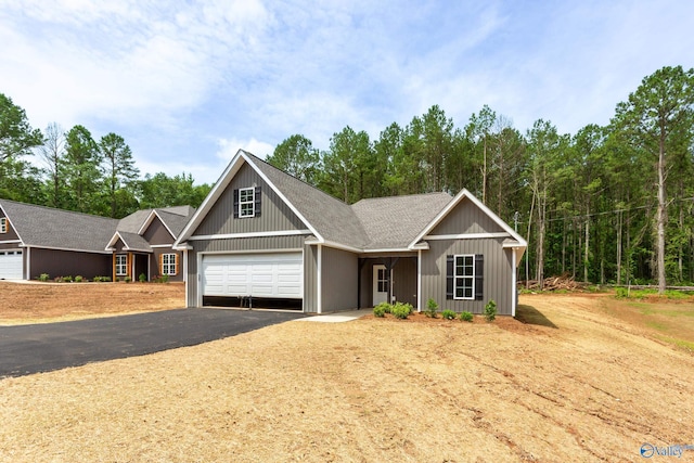 4452 Sibert St S, Gadsden, AL 35903 - view of front facade featuring asphalt driveway and a garage