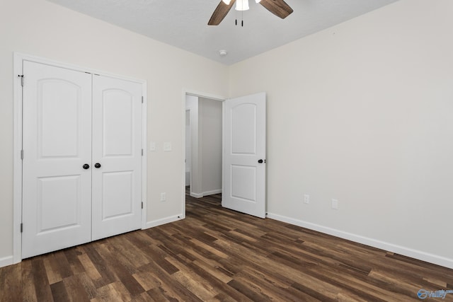 4452 Sibert St S, Gadsden, AL 35903 - unfurnished bedroom with dark wood-type flooring, a closet, and a ceiling fan