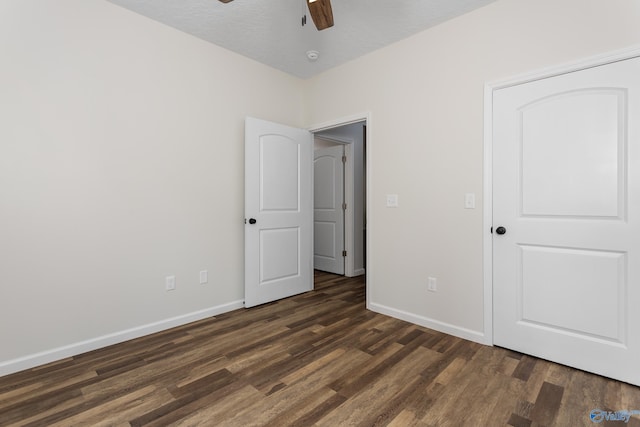 4452 Sibert St S, Gadsden, AL 35903 - unfurnished bedroom featuring dark wood-style flooring and ceiling fan