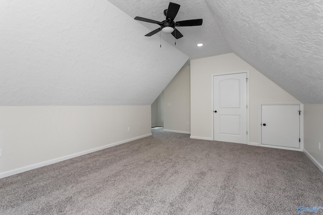 4452 Sibert St S, Gadsden, AL 35903 - bonus room featuring a textured ceiling, carpet, vaulted ceiling, and a ceiling fan