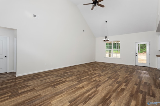 4452 Sibert St S, Gadsden, AL 35903 - unfurnished living room featuring high vaulted ceiling, ceiling fan, dark wood-style flooring, and a chandelier