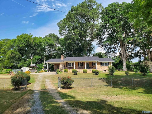 ranch-style home with a carport and a front yard