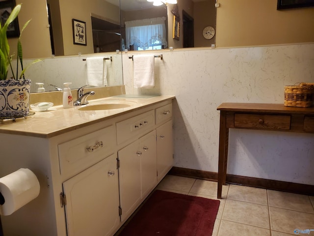bathroom featuring vanity and tile patterned flooring