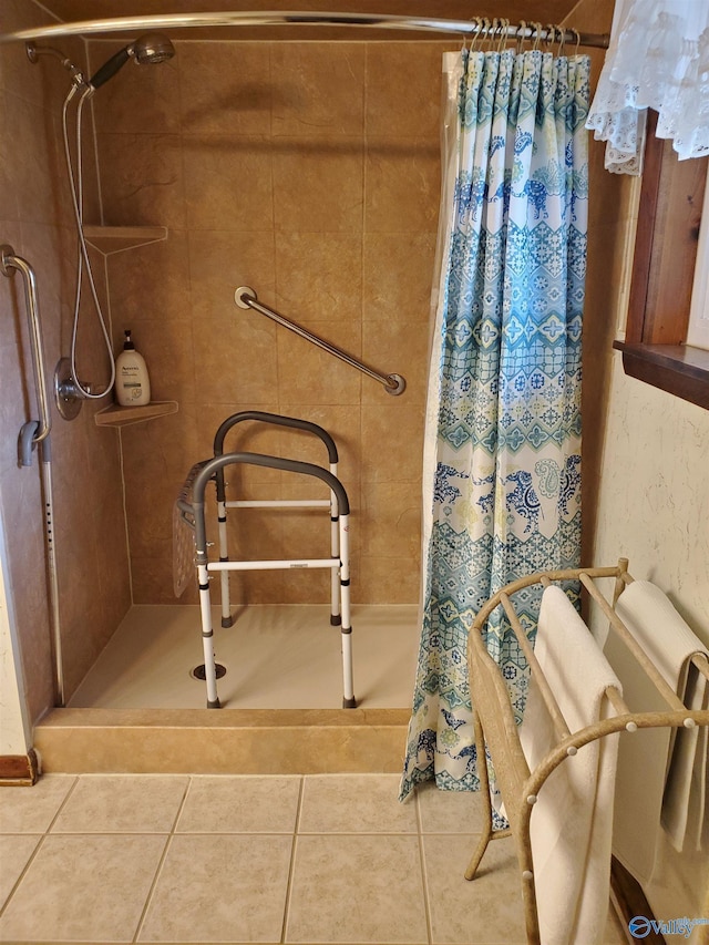 bathroom featuring tile patterned flooring and a shower with shower curtain